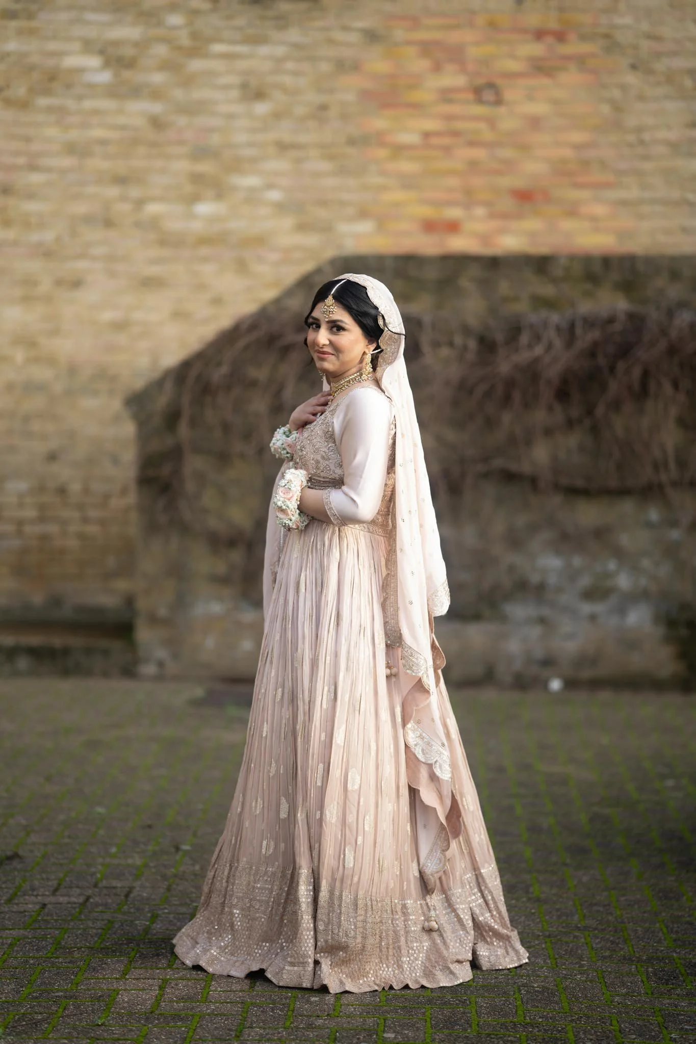birmingham-pakistani-wedding-photography-bride-standing-in-the-park.jpg