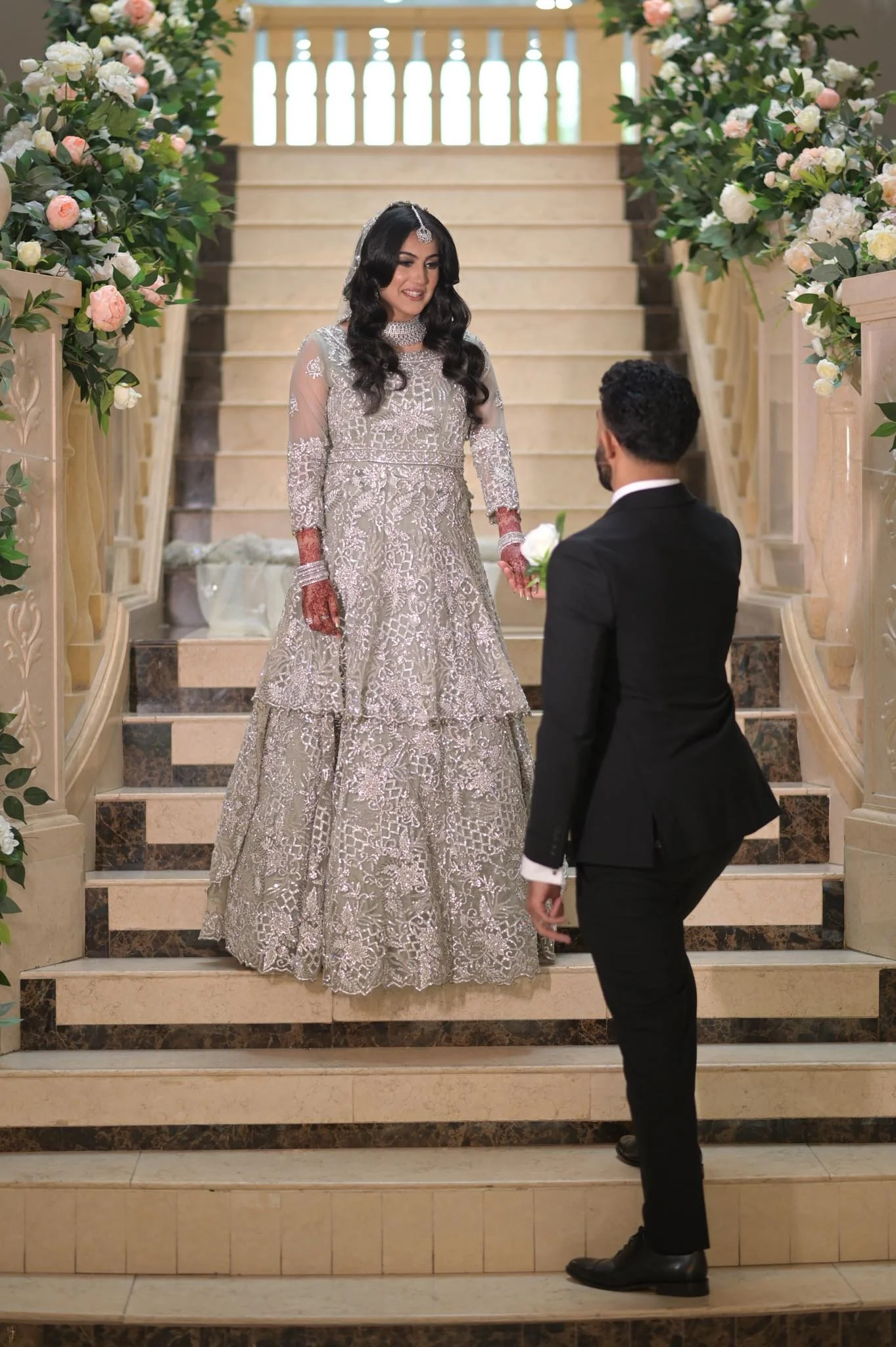 birmingham-london-wedding-pakistani-photographer-bride-and-groom-on-the-stairs.jpg