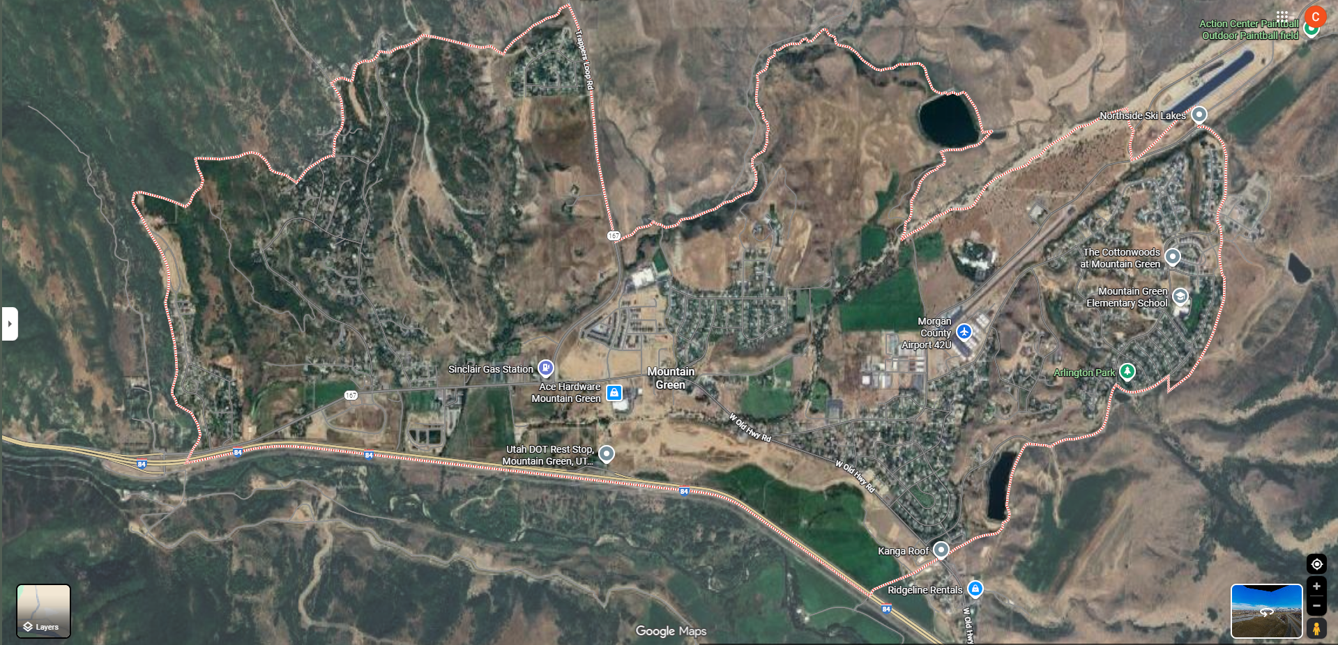 Satellite map view of Mountain Green, Utah, with marked trails and nearby landmarks including Utah DOT Rest Stop, Morgan County Airport, and Northside Ski Lakes.