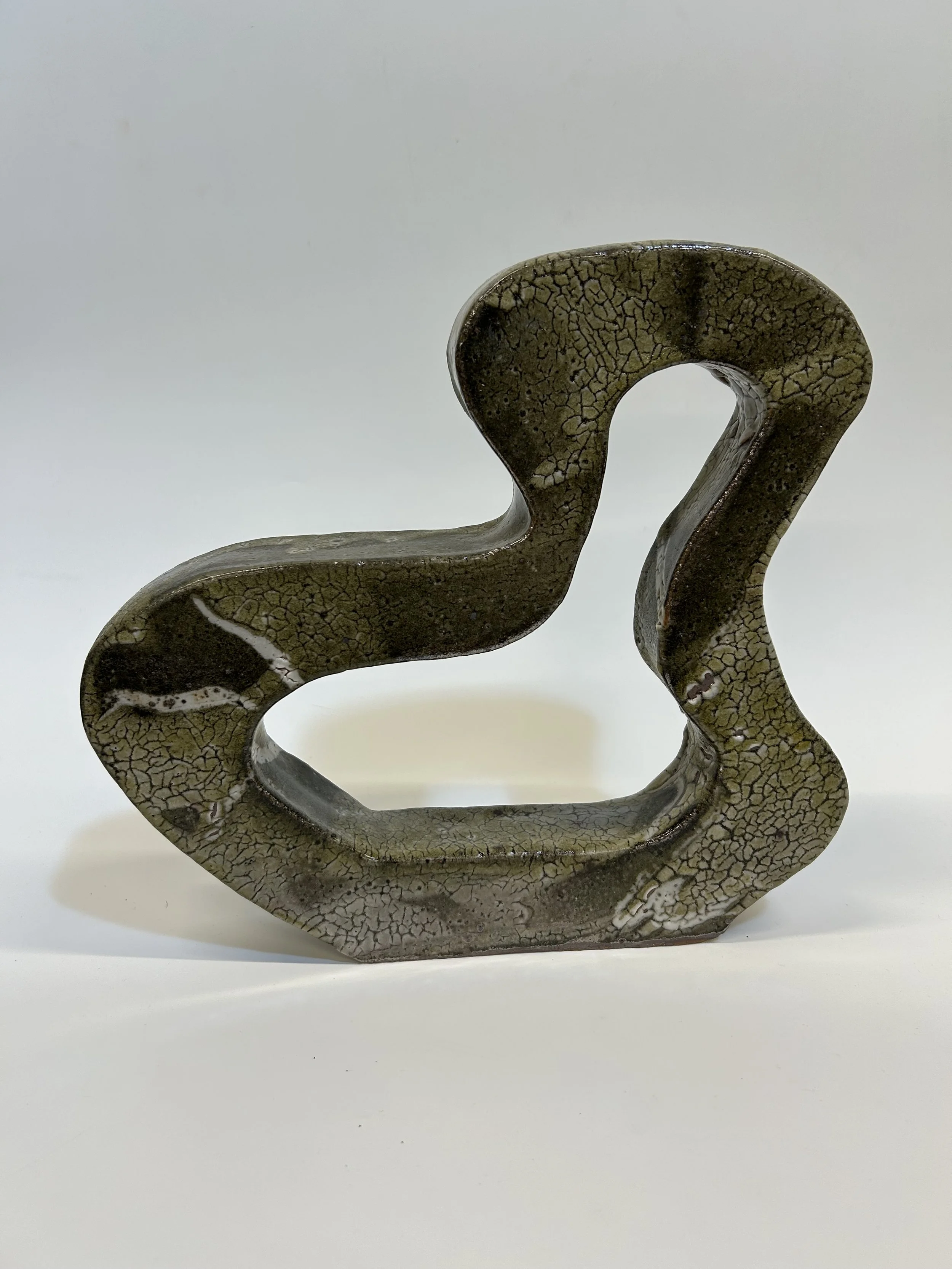 Lichen Loop (2025): This piece, with its weathered textures and organic form, echoes the cracks and growth of personal change. Like the intertwined life of fungus and alga in lichen, the title reflects the loop between our social interactions and the