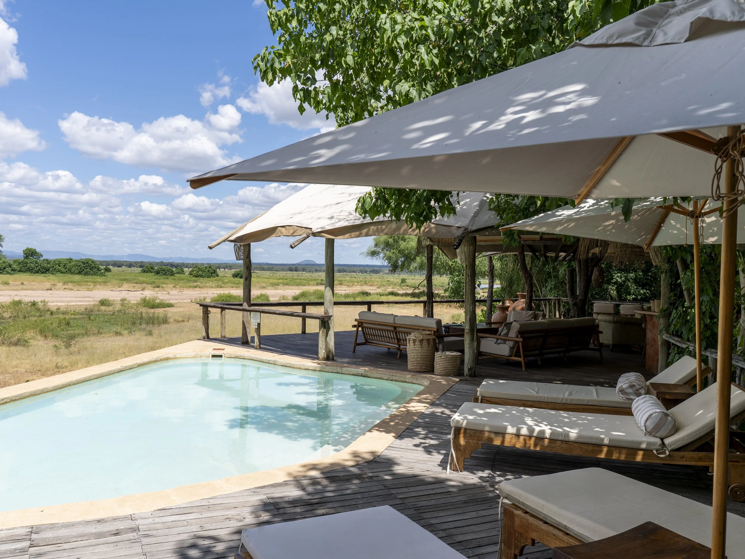 Anabezi Camp deck and safari setting in Zambia’s Lower Zambezi