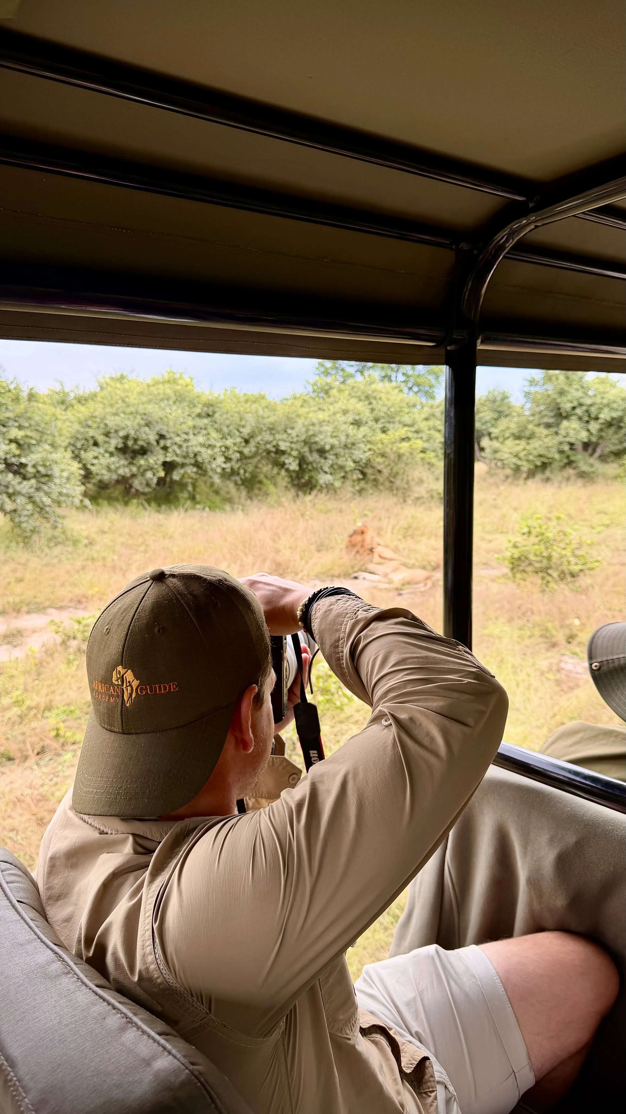 Our guide Marno Jooste taking a photo of a male lion