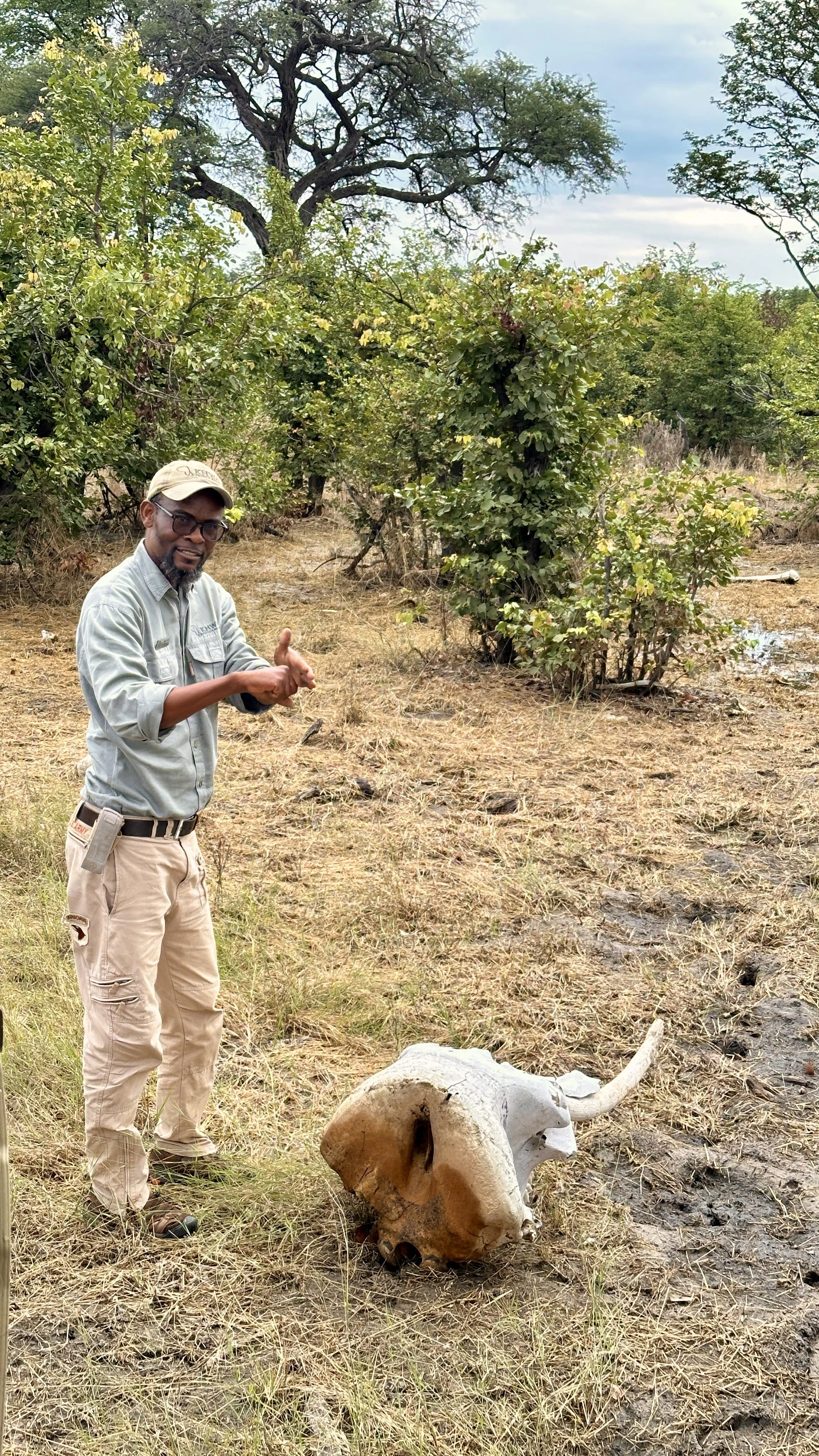 Our guide showing us the remains of an elephant skull