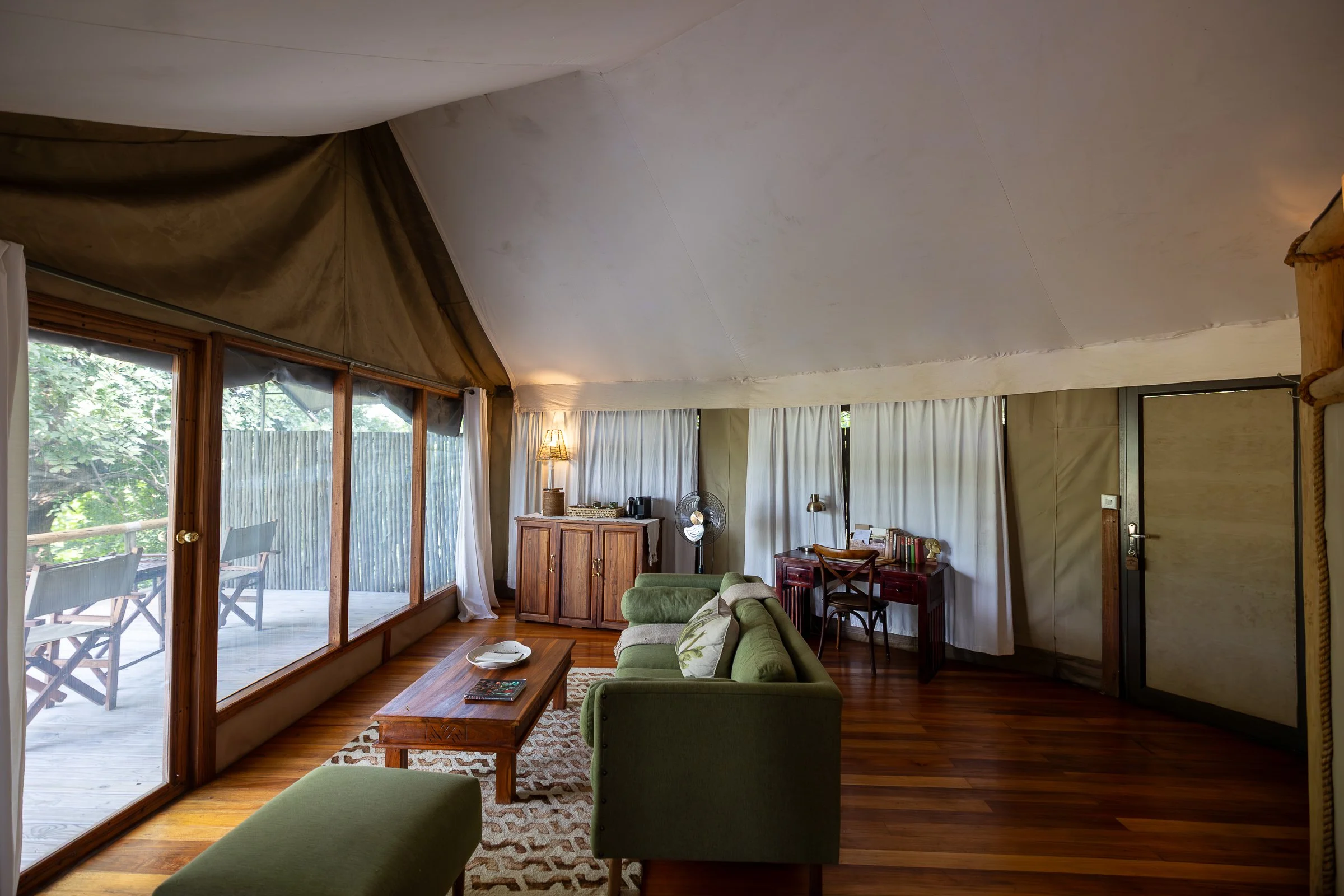 Lounge area inside a guest suite at Anabezi Camp