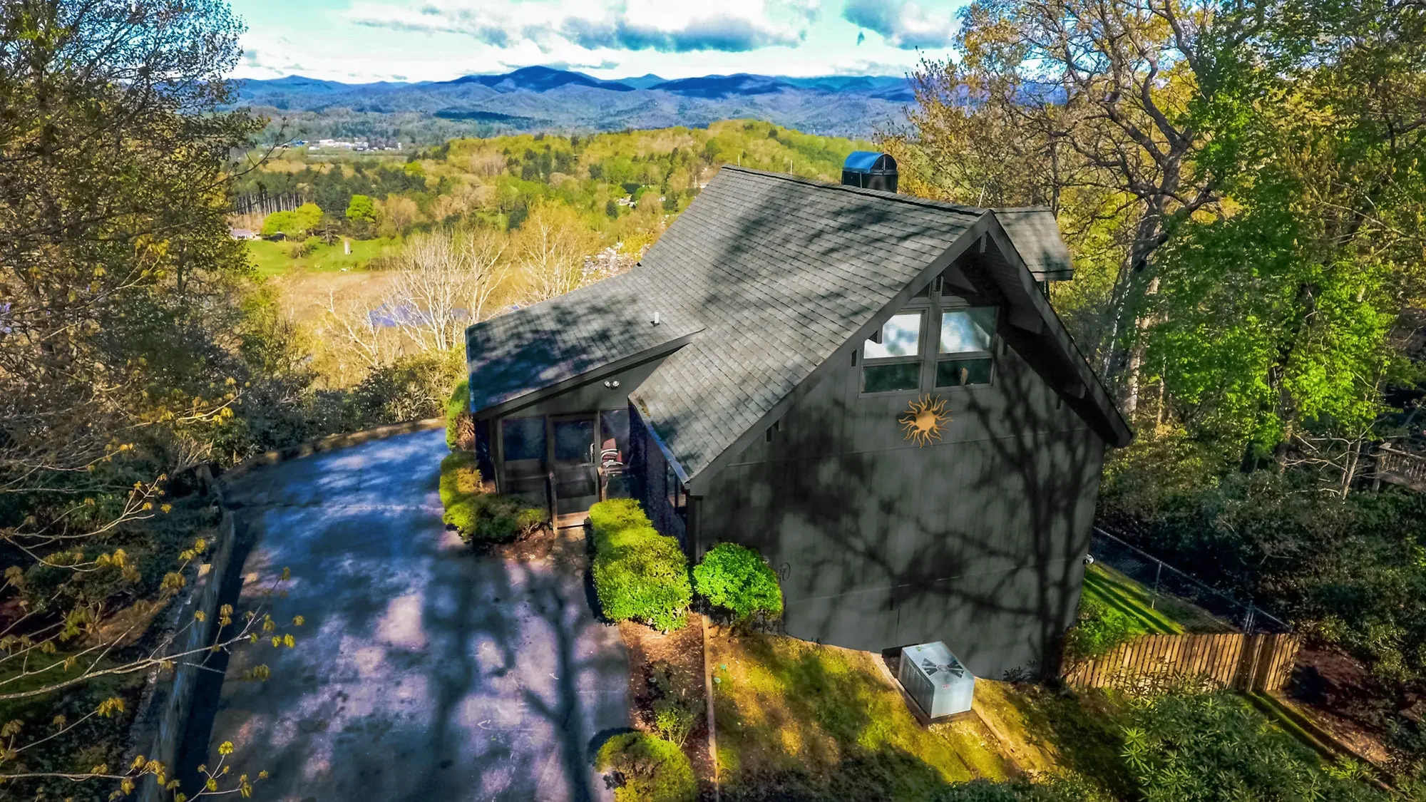 Exterior of Best of All Worlds home during sunset