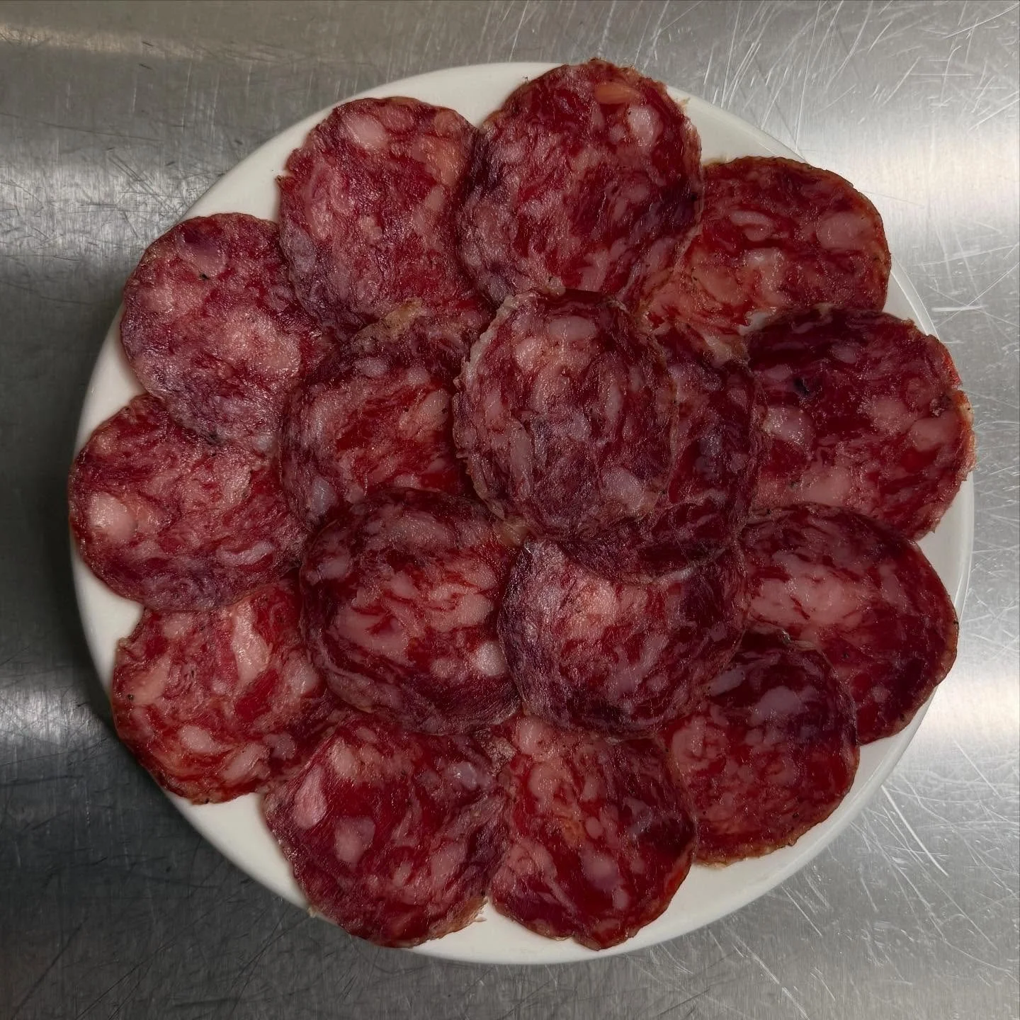 New meat plate on the menu to enjoy this weekend 🍖

Enjoy some fatty, nutty Dry Cured Ib&eacute;rico Pork Salchich&oacute;n alongside one of our bespoke cocktails or a glass of our wine specials

This makes for the perfect bar snack or starter to ki