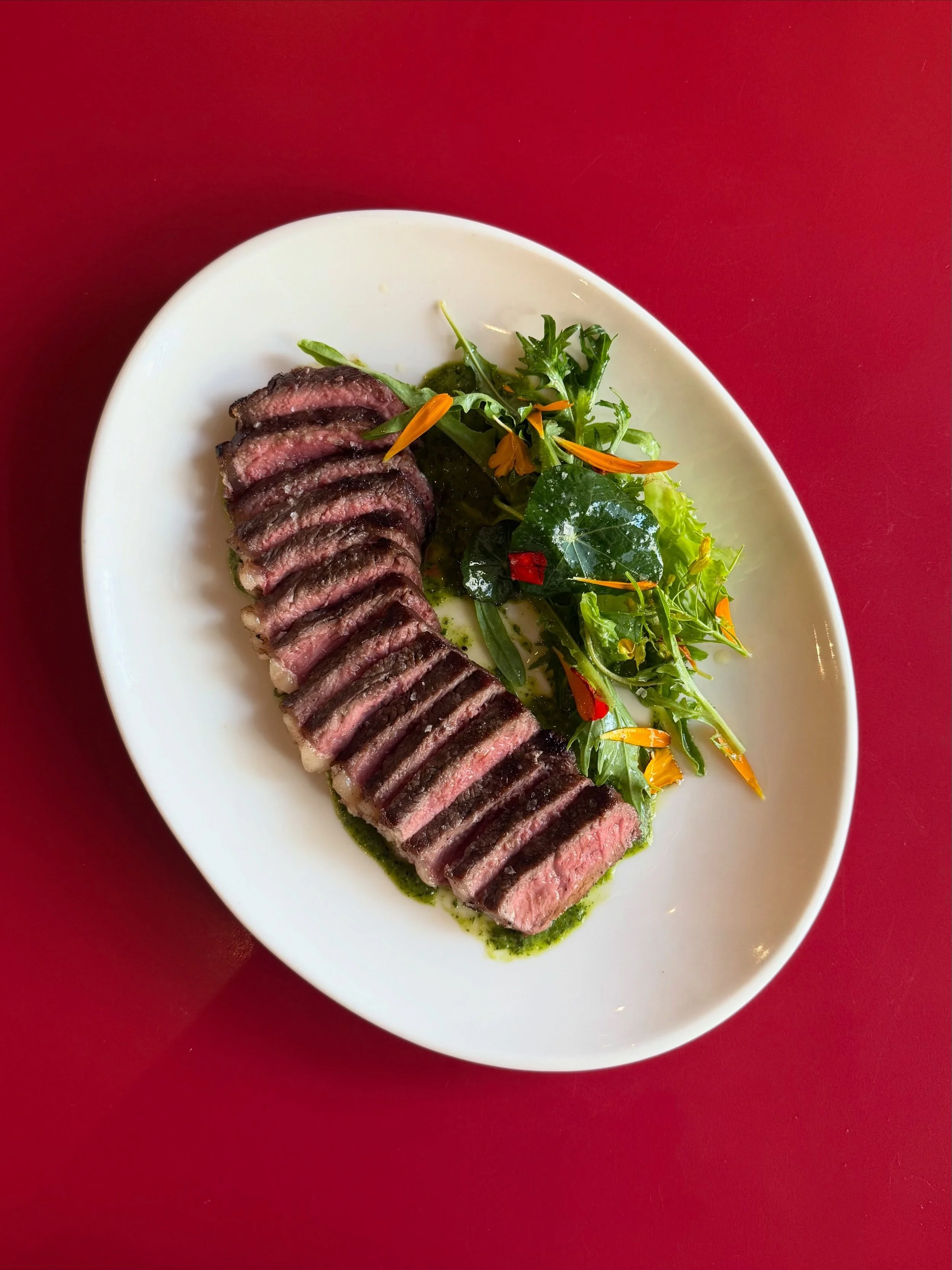 We&rsquo;ve given our steak dish a summer make over and its soooo good

BBQ Sirloin @tastetradition 
Mojo verde butter 
Allotment salad @greenheartgrowers 

One to share? Or not? We won&rsquo;t judge