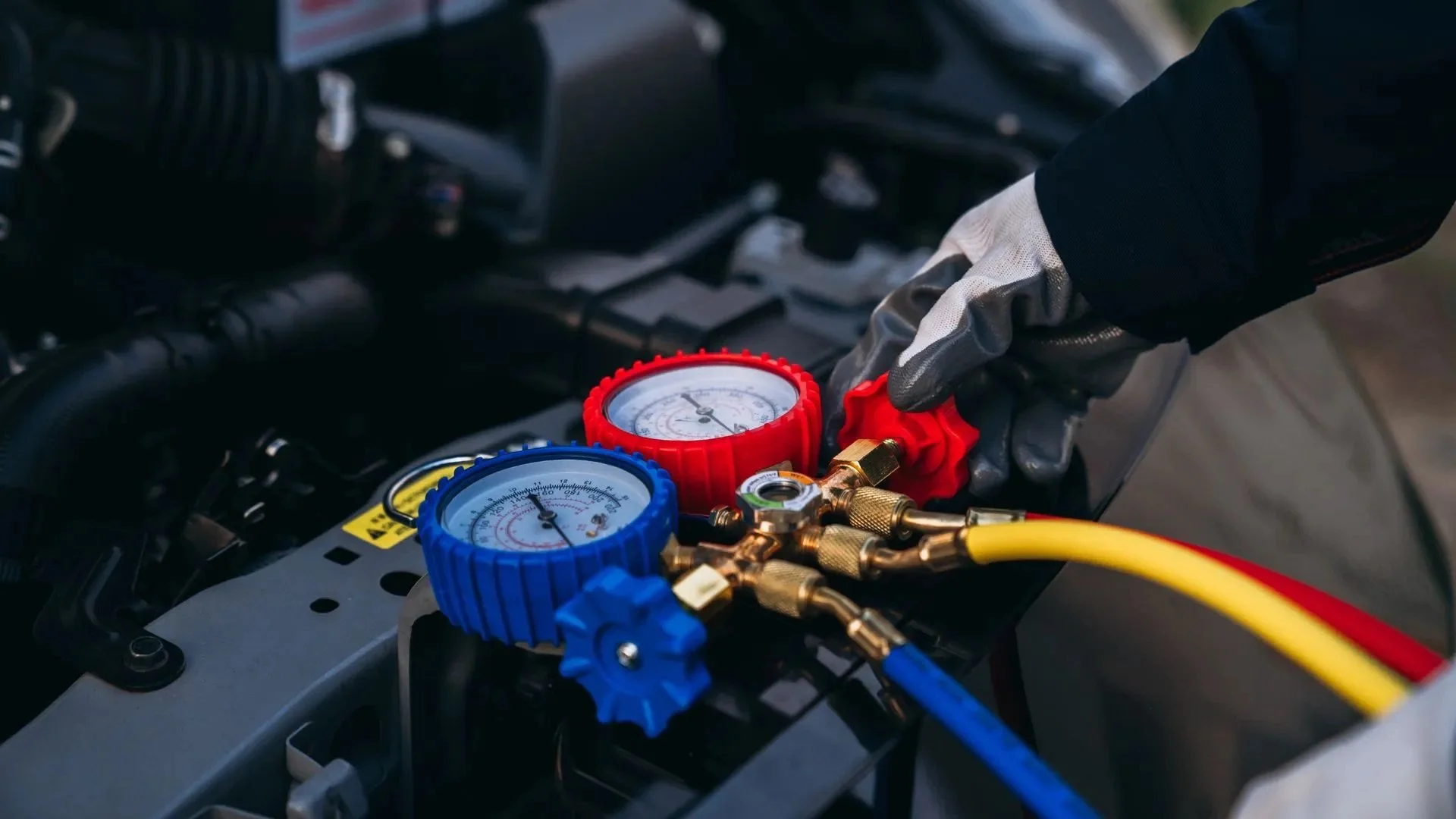 Expert Mechanic inspects car engine and provides AC Tuning/Repair Service
