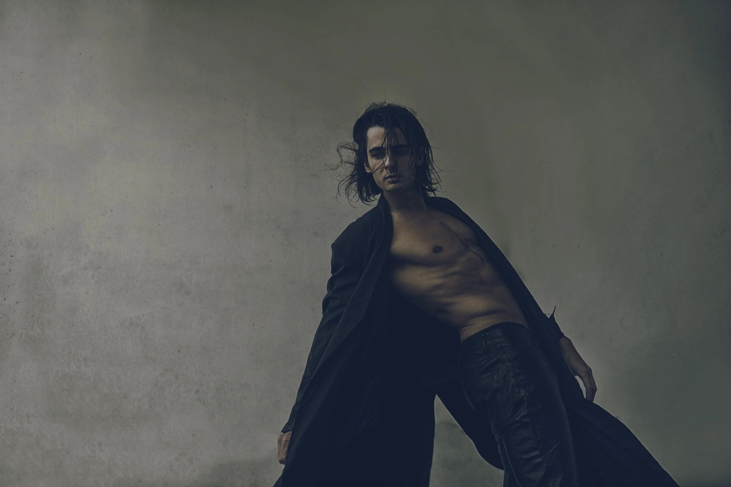 Chloe+Pitterson+Photography-+fine+art+photography++portrait+photography+-fashion+photography++nyc+photographer+beauty+photography+man+leaning+back+in+the Dark.jpg