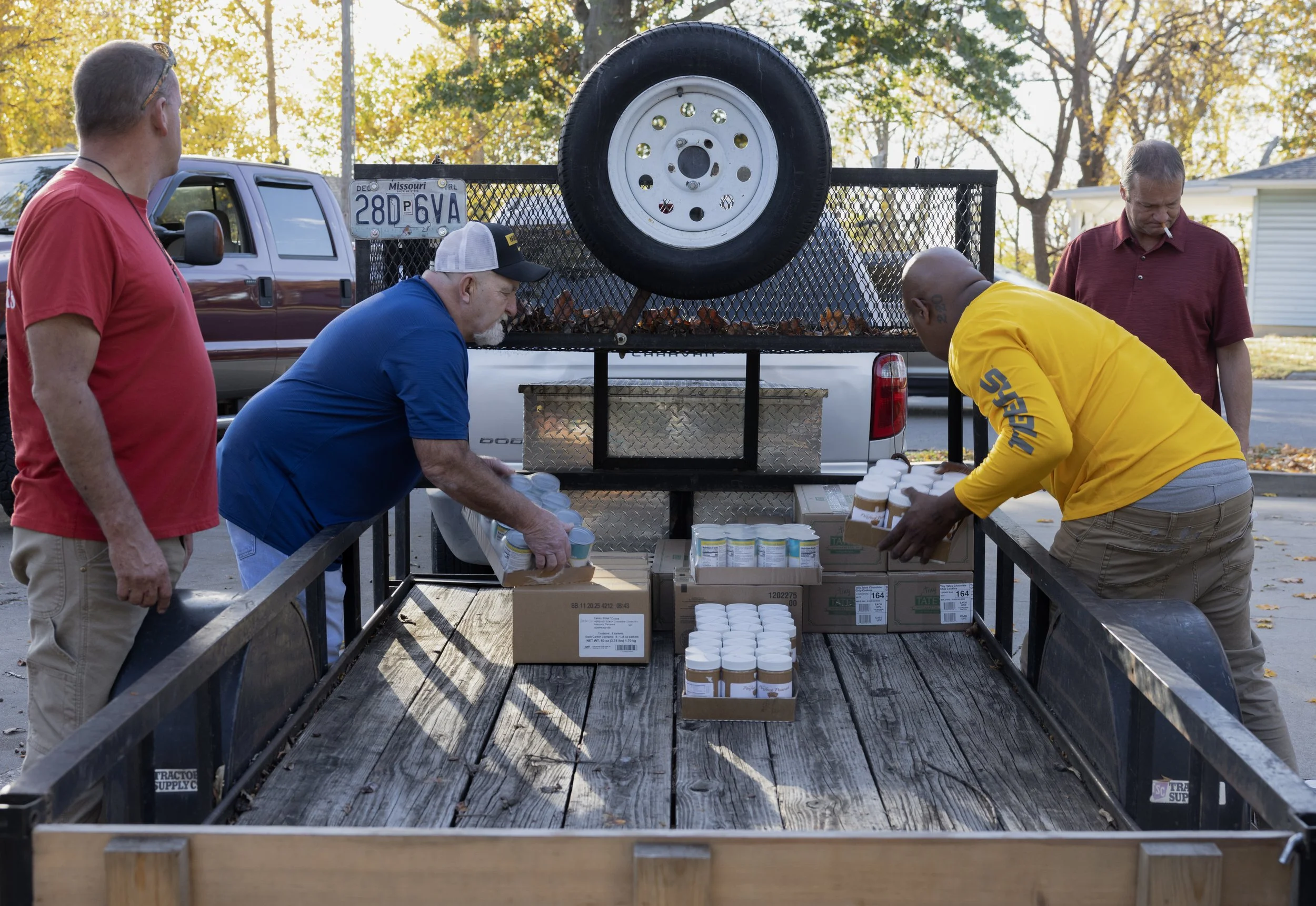 Bobby helps unload food donations given to in2Action along with house managers and other program participants. Bobby hopes to become a certified peer specialist through in2Action, potentially becoming the house manager for the Daisy House one day. 