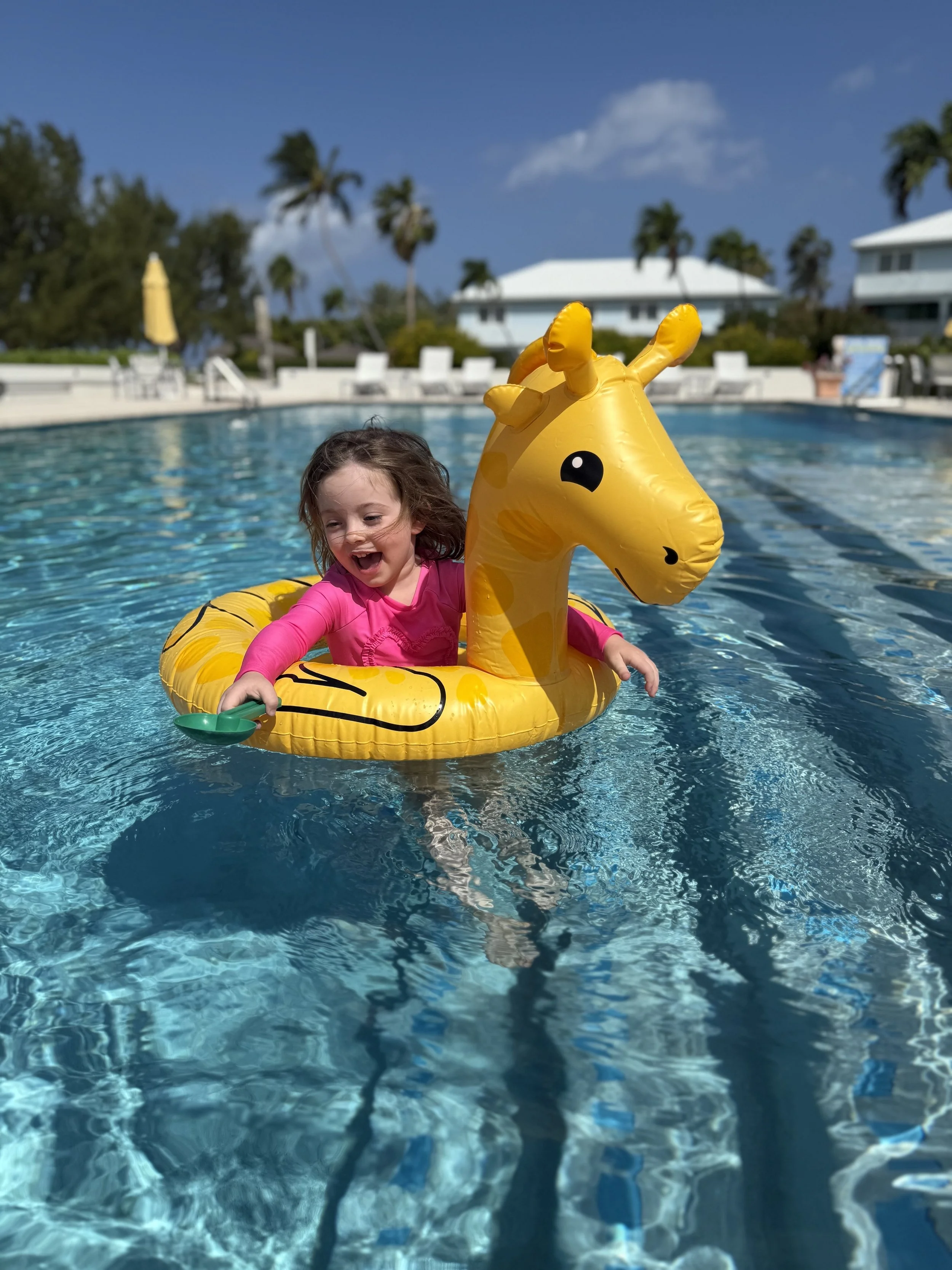 M in pool at Silver Sands Grand Cayman.jpg