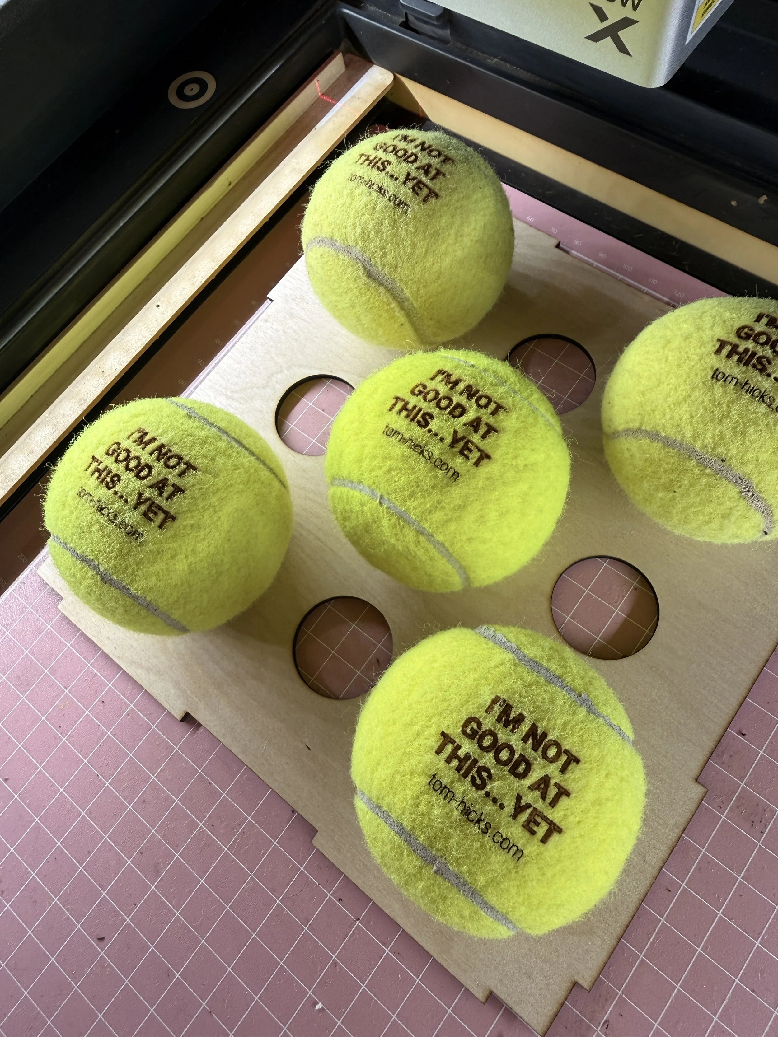 tom-hicks-juggling-workshop-branded-tennis-balls.jpg