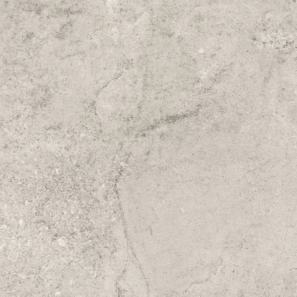Close-up of a light-colored concrete surface with some texture.