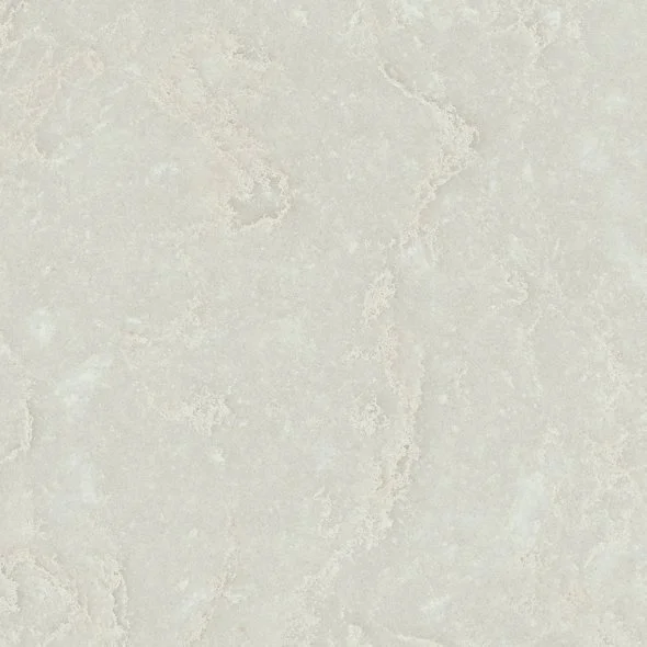 Close-up of a light-colored stone or tile surface with subtle texture and patterns.