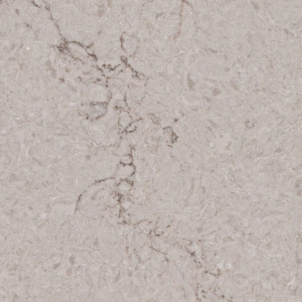 Close-up of a beige and gray marble or stone surface with natural veining.
