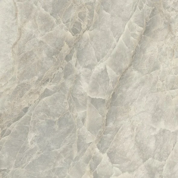 Close-up of light gray marble surface with natural veining.