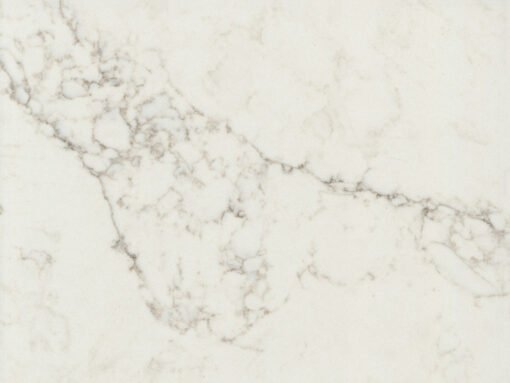 Close-up of a cream-colored marble surface with light brown veining.