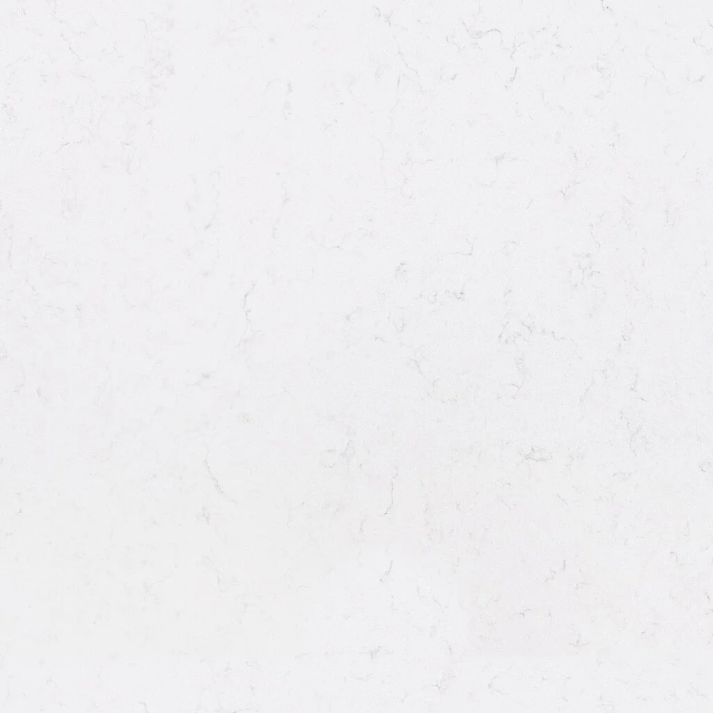 A plain white wall with a subtle textured pattern.