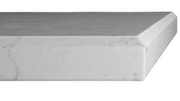 Close-up of a tiled bathroom or kitchen countertop edge.