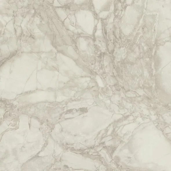 Close-up of a marble surface with light beige and brown veining.