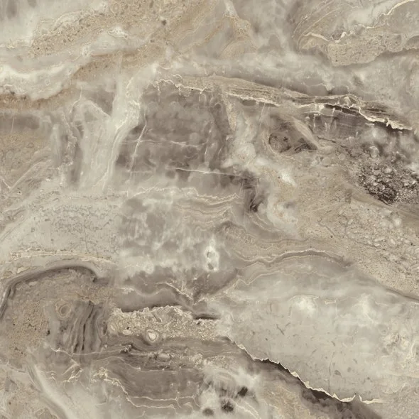 Close-up of a polished marble surface with beige, gray, and white swirling patterns.