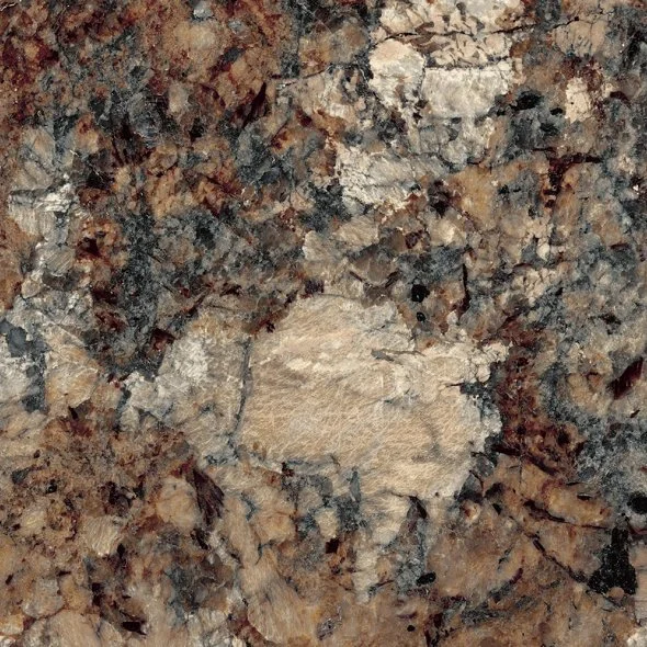 Close-up of a granite countertop with a hole in the surface.