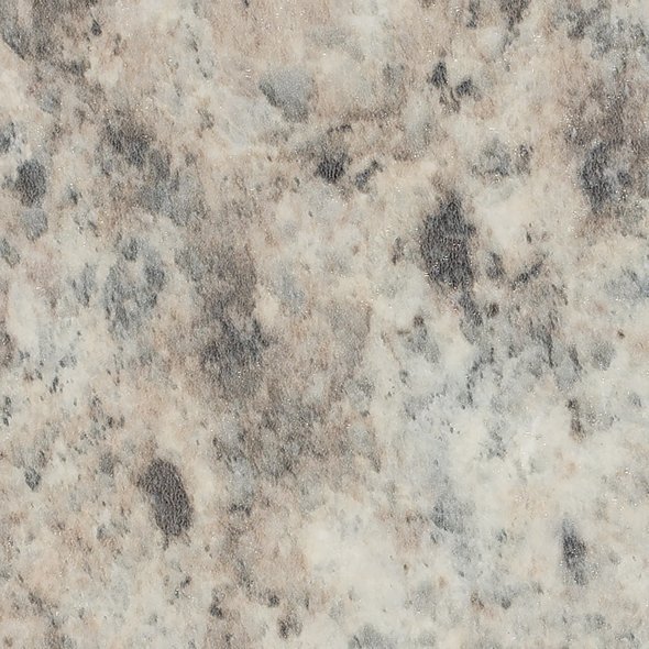 Close-up of a granite countertop with a speckled pattern in shades of gray, beige, and black.