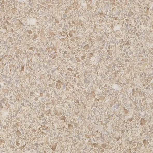 Close-up of a beige speckled stone or granite surface.