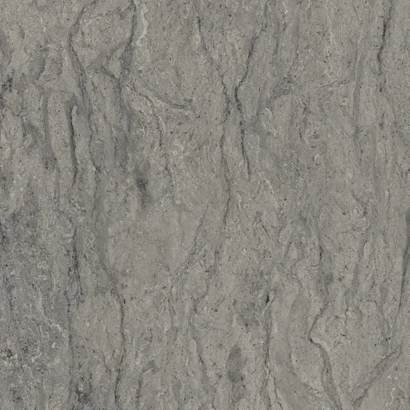 Close-up of a textured stone or concrete surface with natural gray color and irregular patterns.