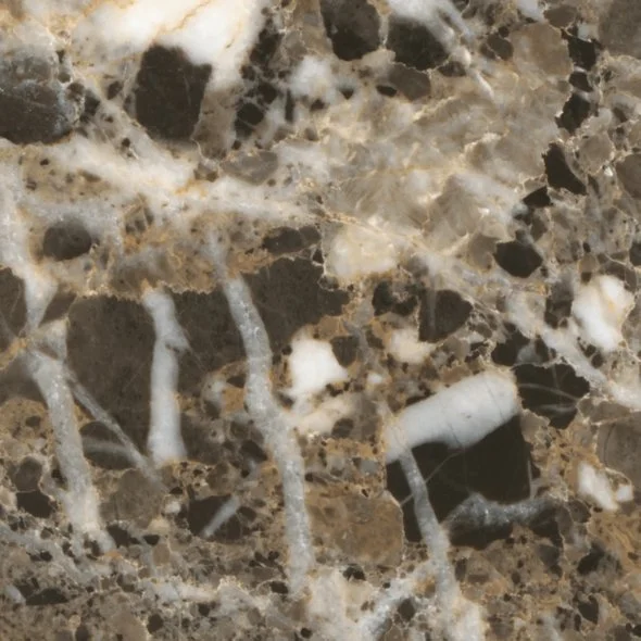Close-up of a brown, black, and white marble surface with veining.