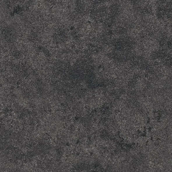 Close-up of a textured, dark gray, and black concrete surface.
