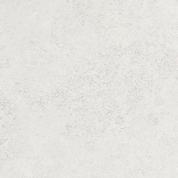 A plain, light-colored textured wall or surface.