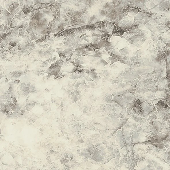 Close-up of a textured, marbled surface with shades of gray and white.