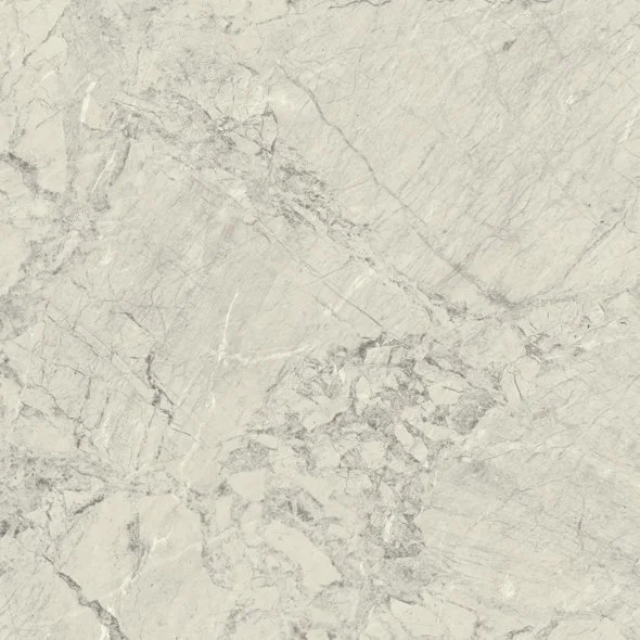 Close-up of a light gray marble surface with natural veining and texture.