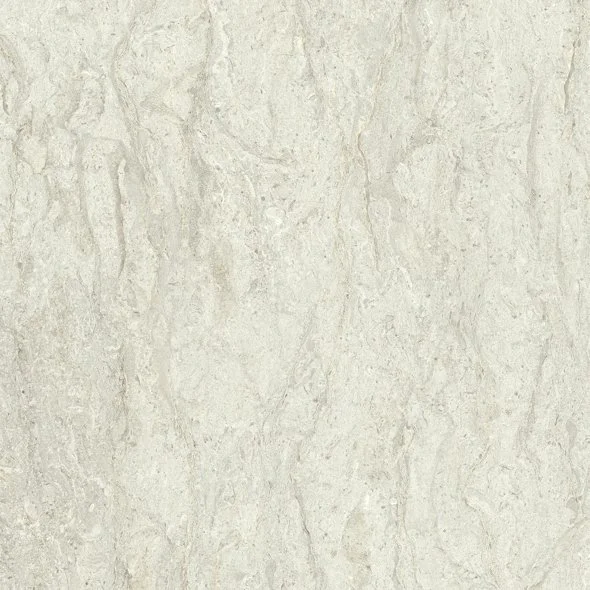 Close-up of a textured beige stone or tile surface.