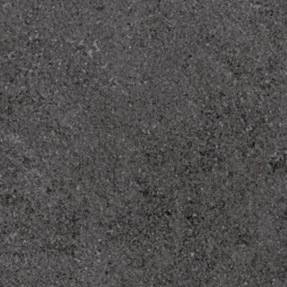 Close-up of a gray asphalt road or pavement surface.