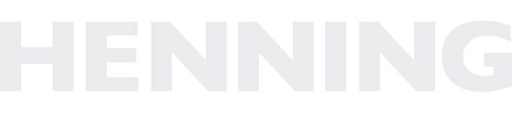 Close-up of the word "HENNING" in bold, black uppercase letters on a white background.