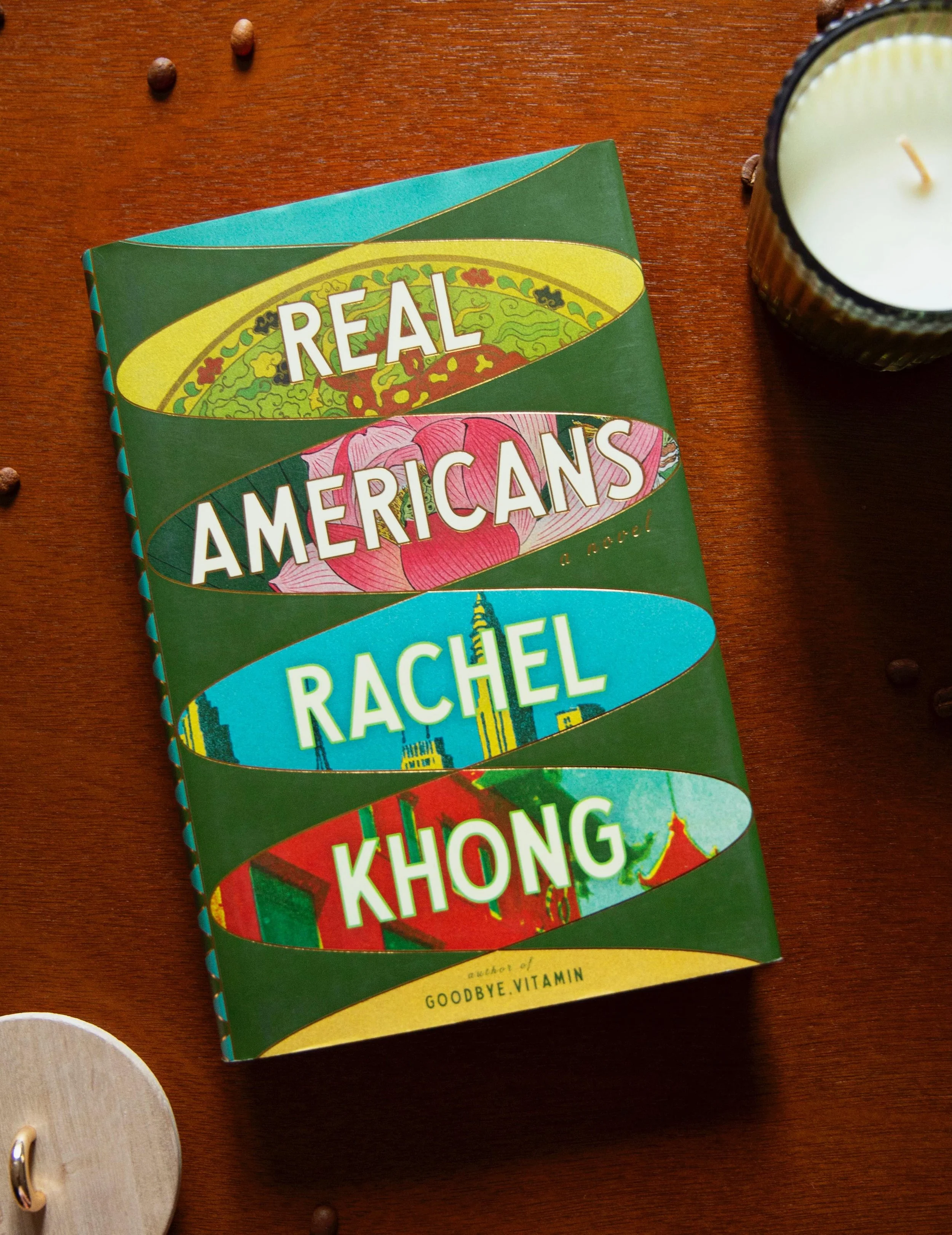Some stories entertain you.
Some stories quietly unravel everything you thought you knew about identity, family, and belonging.

Our July book club pick is Real Americans by Rachel Khong &mdash; a sweeping, emotional story about ambition, inheritance