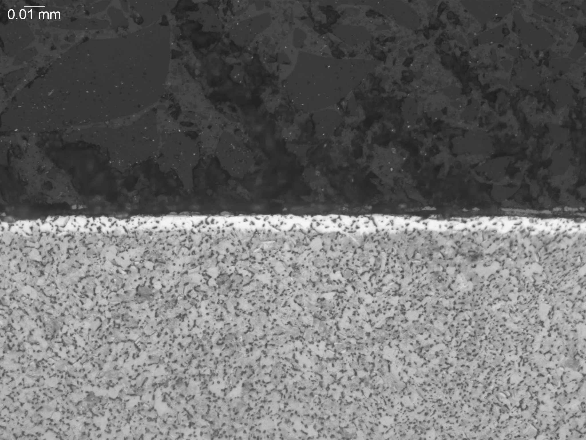 Alpha case on Ti-6Al-4V, metallographic cross-sectional evaluation measuring oxygen-rich alpha case depth penetration, brittle layer morphology, and subsurface phase stabilization in an aerospace titanium alloy per GE S-400 quality specifications, AS