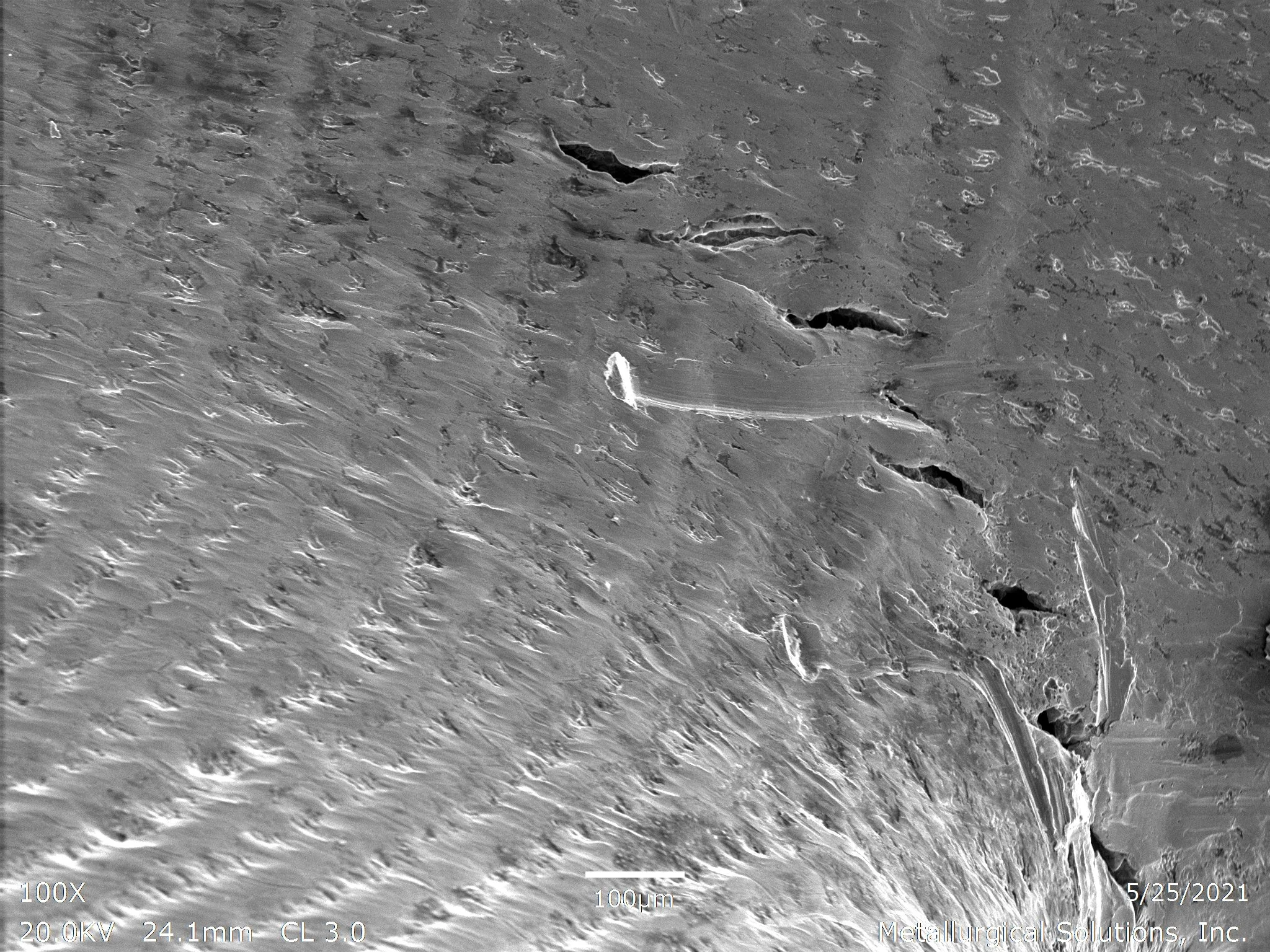 Solidification cracks showing fatigue striations and beach-mark morphology, scanning electron microscope SEM fractography evaluation identifying localized hot cracking and progressive cyclic separation within the same solidification crack sample per 