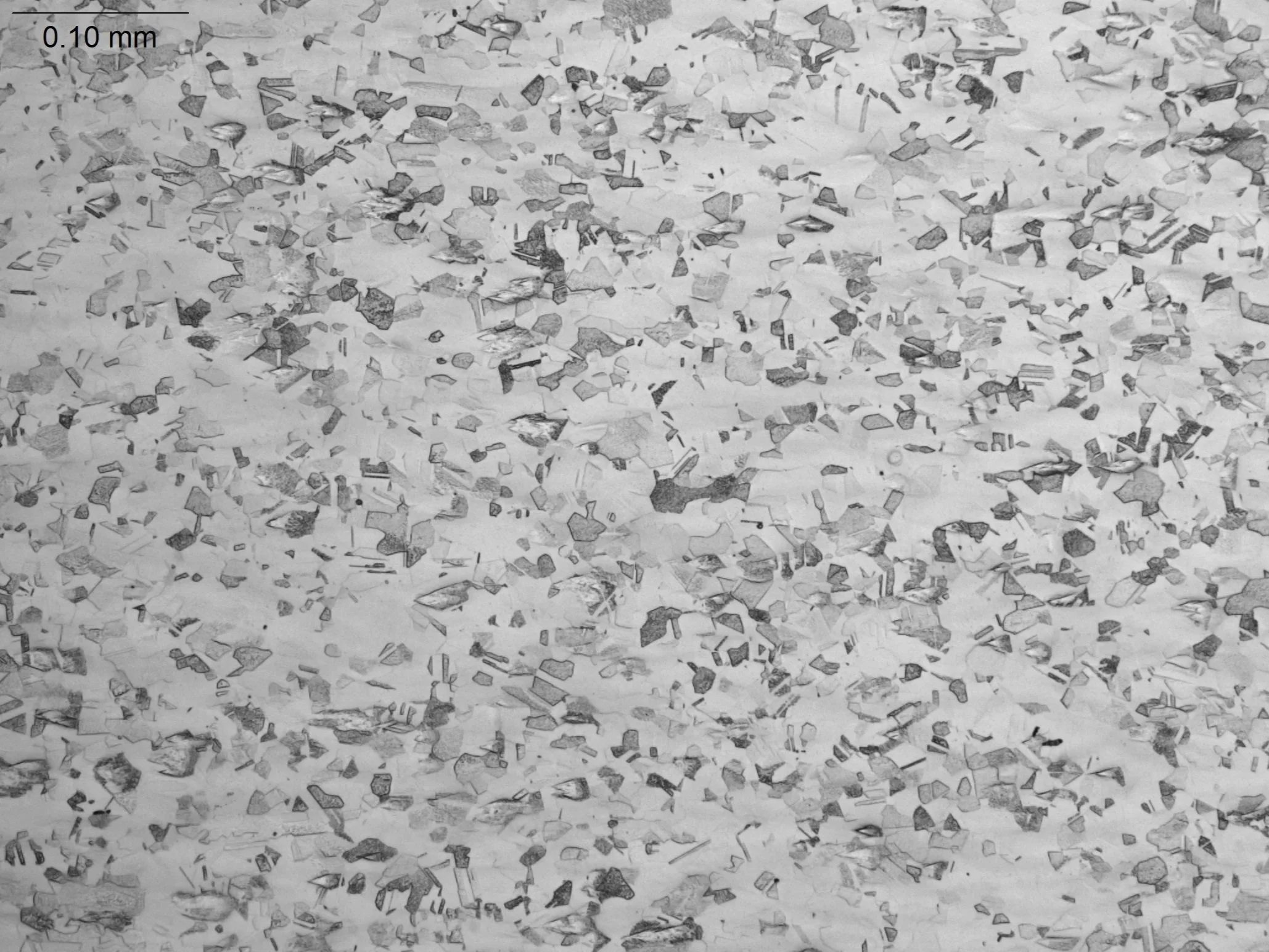 10kt Gold Sheet Material, 200x, metallographic microstructural evaluation analyzing grain structure, deformation bands, and phase distribution in a precious metal alloy sheet per ASTM E3 under ISO 17025 accredited laboratory standards.

