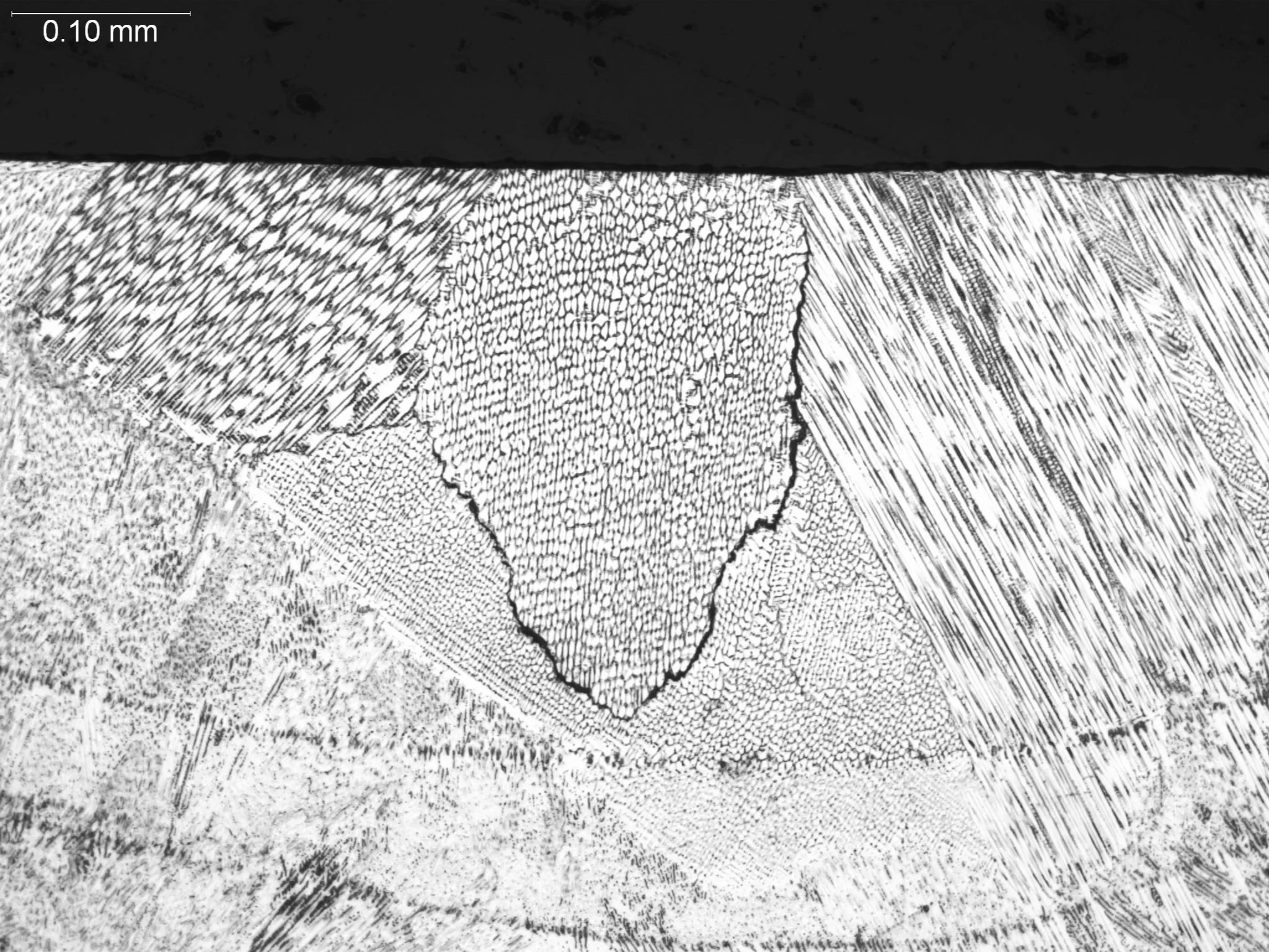 Laser weld with interdendritic cracking 200x, metallographic cross-sectional evaluation identifying hot cracking, cellular-dendritic solidification networks, and microstructural phase boundaries within a laser beam weld fusion zone per AWS D17.1 and 