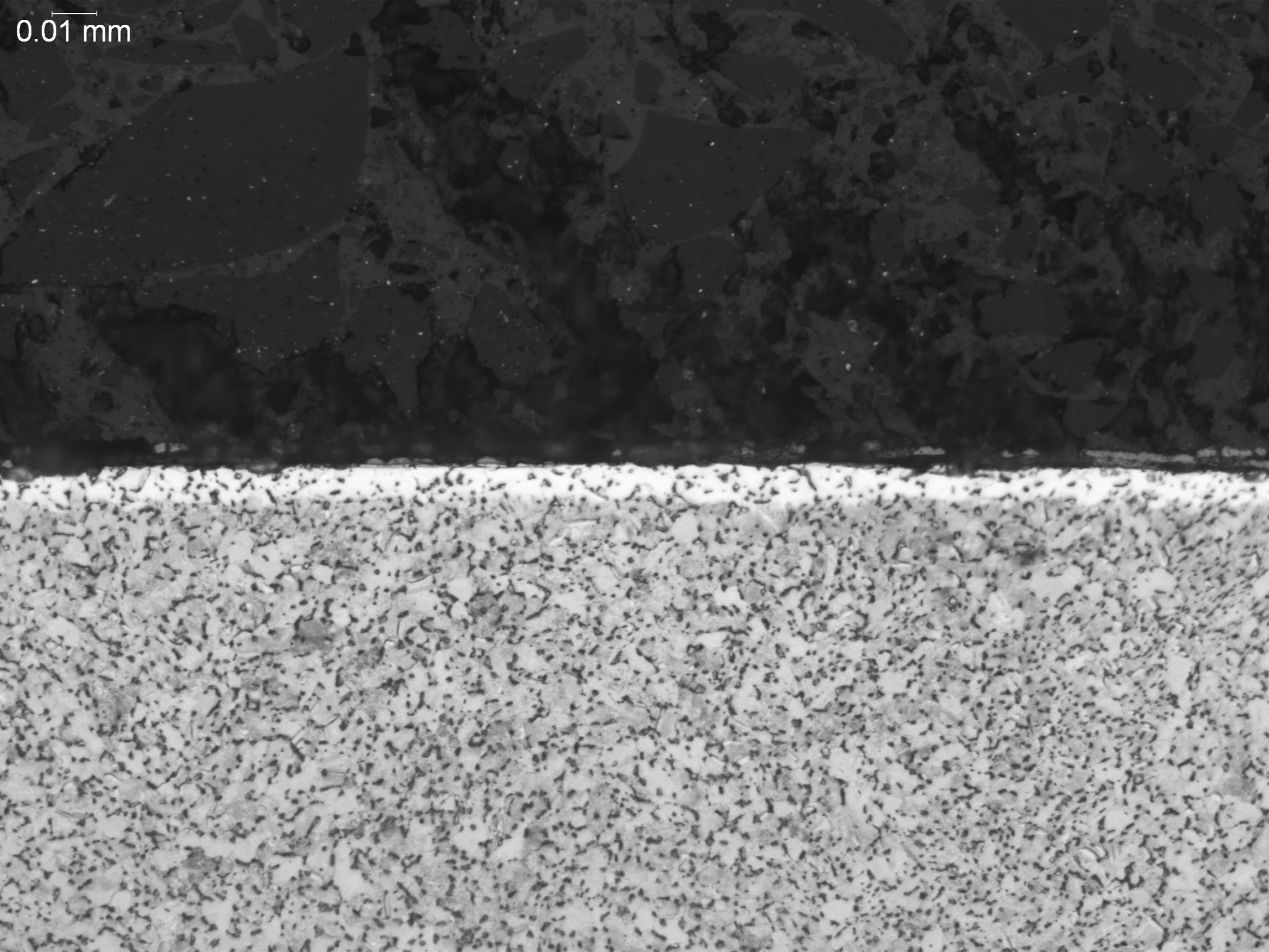 Alpha case on Ti-6Al-4V, metallographic cross-sectional evaluation measuring oxygen-rich alpha case depth penetration, brittle layer morphology, and subsurface phase stabilization in an aerospace titanium alloy per GE S-400 quality specifications, AS
