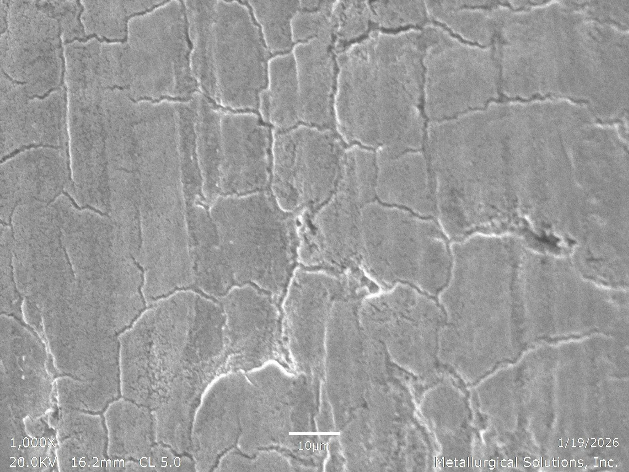 Incipient melting on steel at 1000x magnification, scanning electron microscope (SEM) evaluation identifying localized grain boundary liquation, an interlocking microstructural degradation network, and burning boundaries from thermal overheating per 