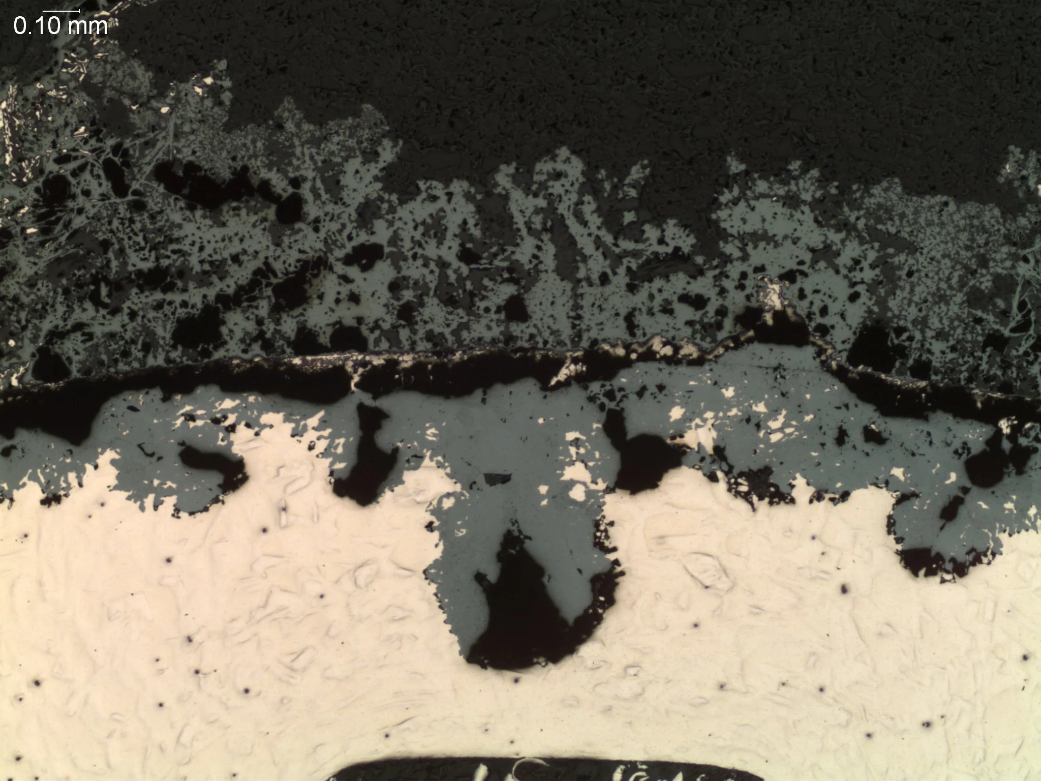 Pitting corrosion 50x, metallographic cross-sectional evaluation identifying subsurface cavity propagation, a stratified oxide scale layer, and localized matrix consumption zones per ASTM G46 and ASTM E3 under ISO 17025 accredited laboratory standard