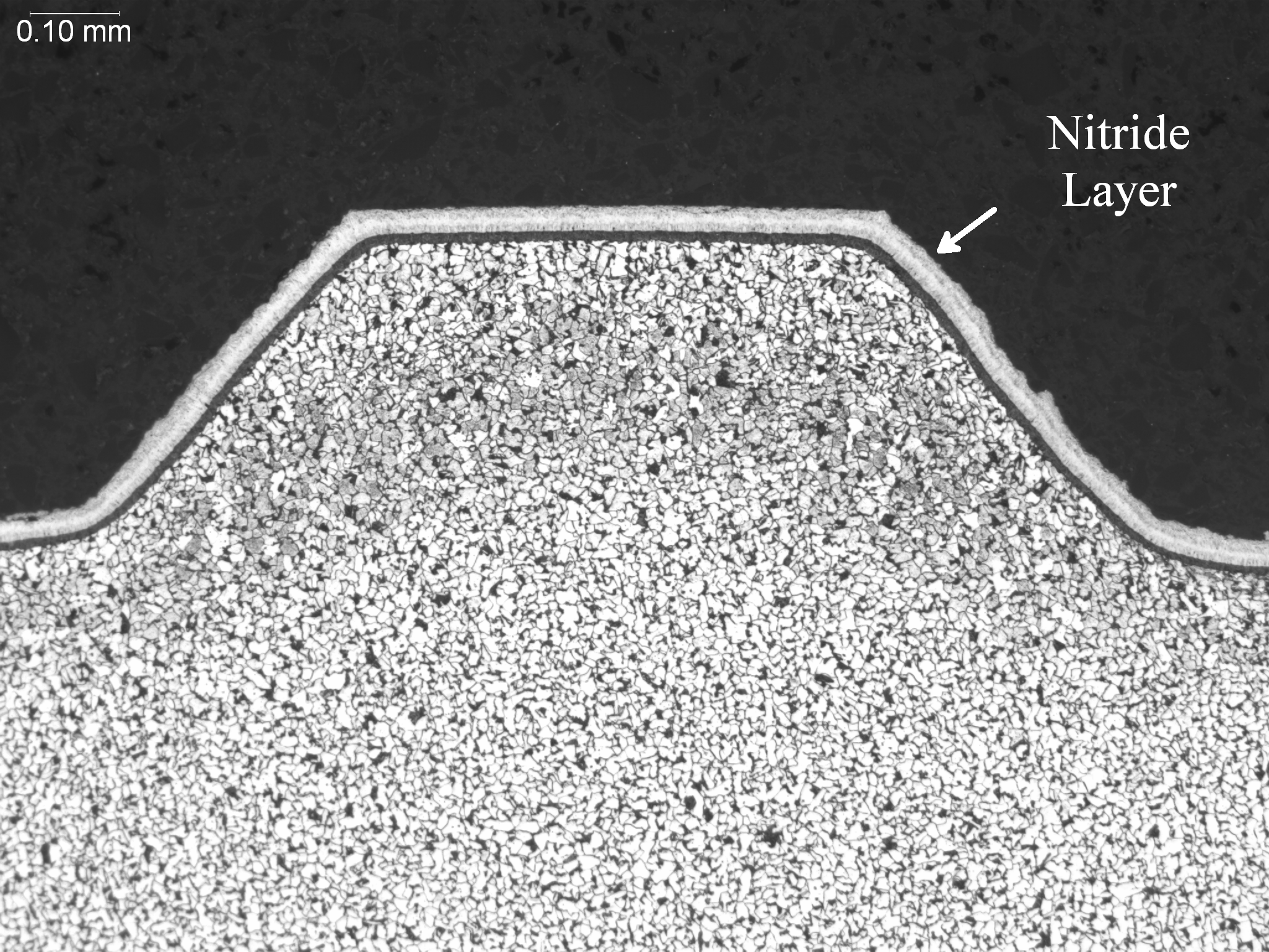 Microstructural failure analysis of a fractured automotive drive shaft displaying fatigue propagation and mechanical stress fracture features.