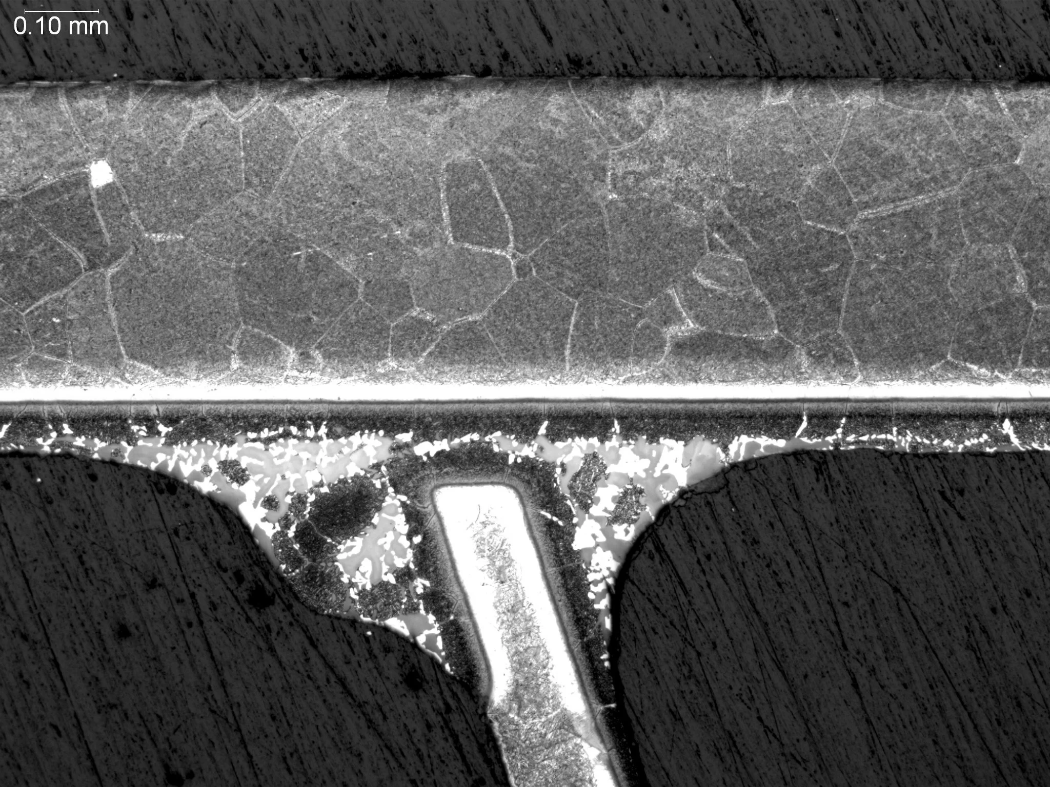 Good braze joint, metallographic cross-sectional evaluation highlighting complete base metal wetting, uniform joint clearance capillary flow, and an optimal braze fillet interface profile per AWS C3.8M and ASTM E3 under ISO 17025 accredited laborator