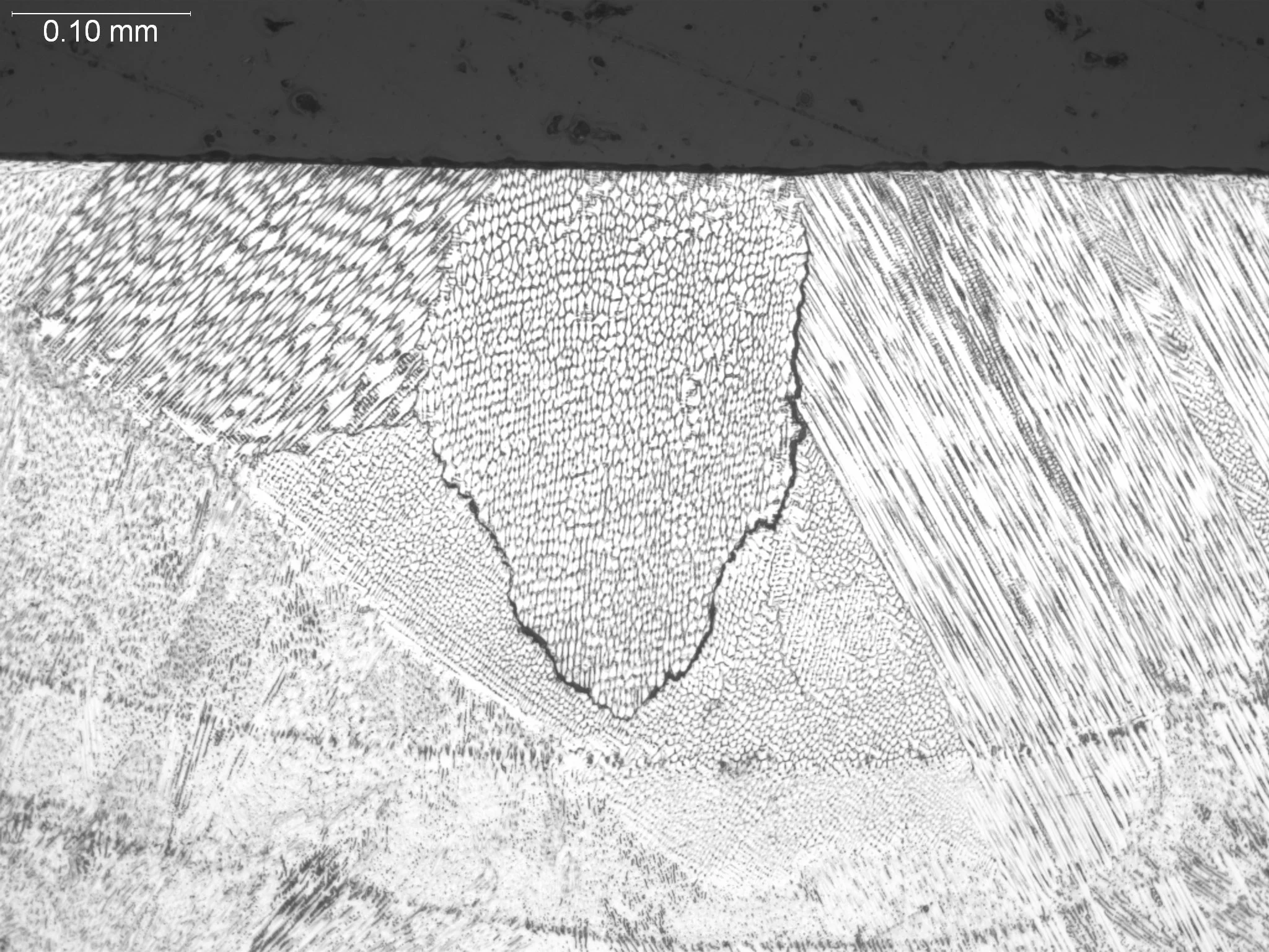 Laser weld with interdendritic cracking 200x, metallographic cross-sectional evaluation identifying hot cracking, cellular-dendritic solidification networks, and microstructural phase boundaries within a laser beam weld fusion zone per AWS D17.1 and 