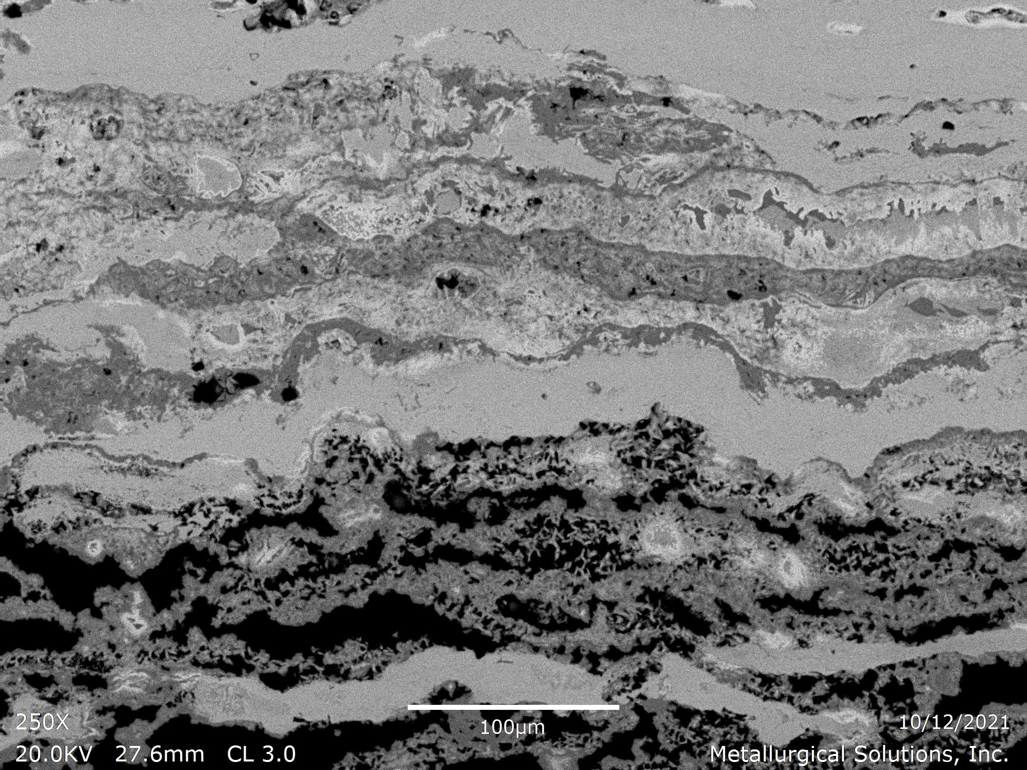 Exfoliation corrosion 250x, scanning electron microscope SEM evaluation identifying severe exfoliation corrosion propagation, a highly stratified oxide scale morphology, and delaminated intergranular layer separation per ASTM G34 and ASTM E3 under IS