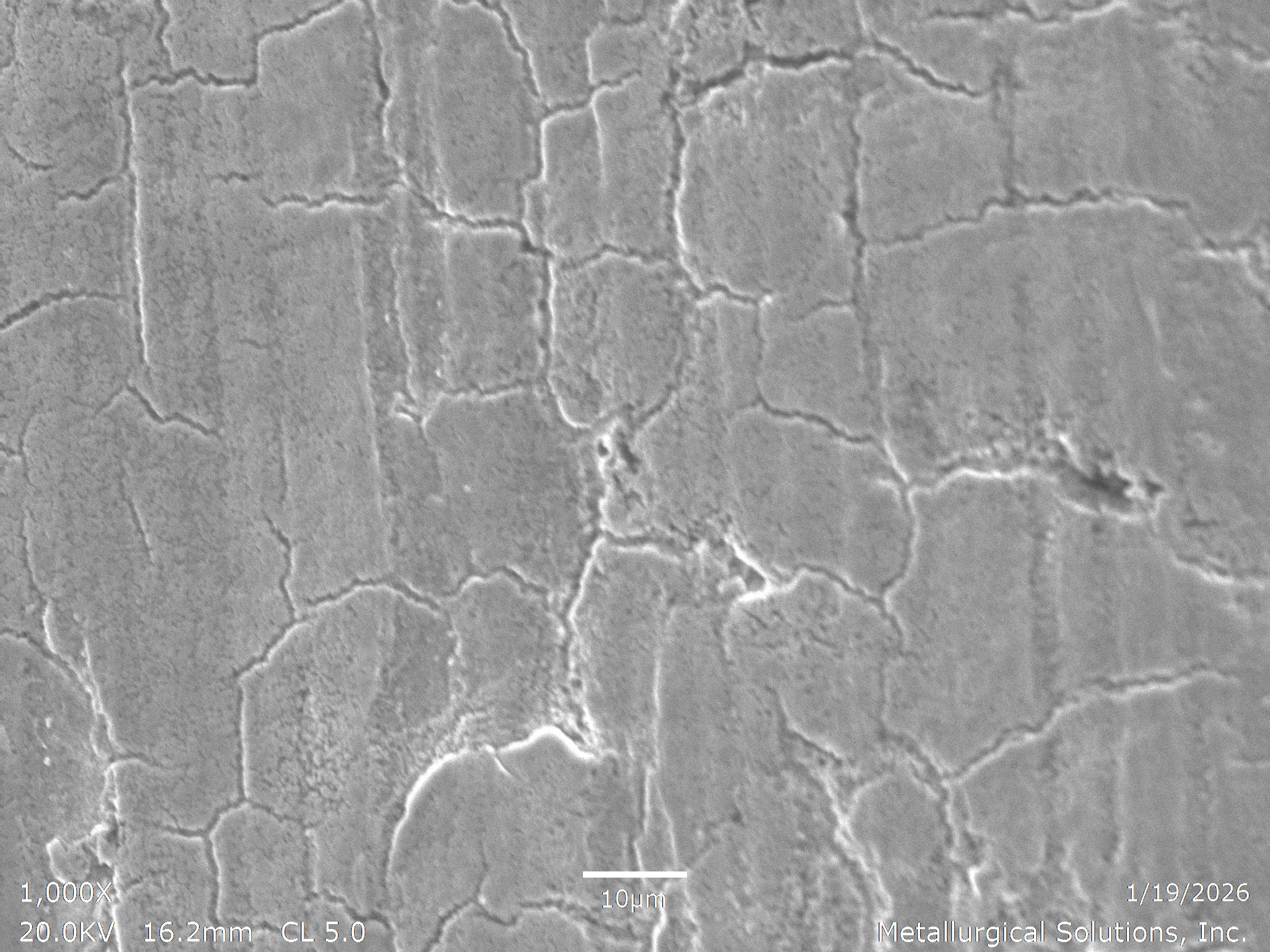 Incipient melting on steel at 1000x magnification, scanning electron microscope (SEM) evaluation identifying localized grain boundary liquation, an interlocking microstructural degradation network, and burning boundaries from thermal overheating per 